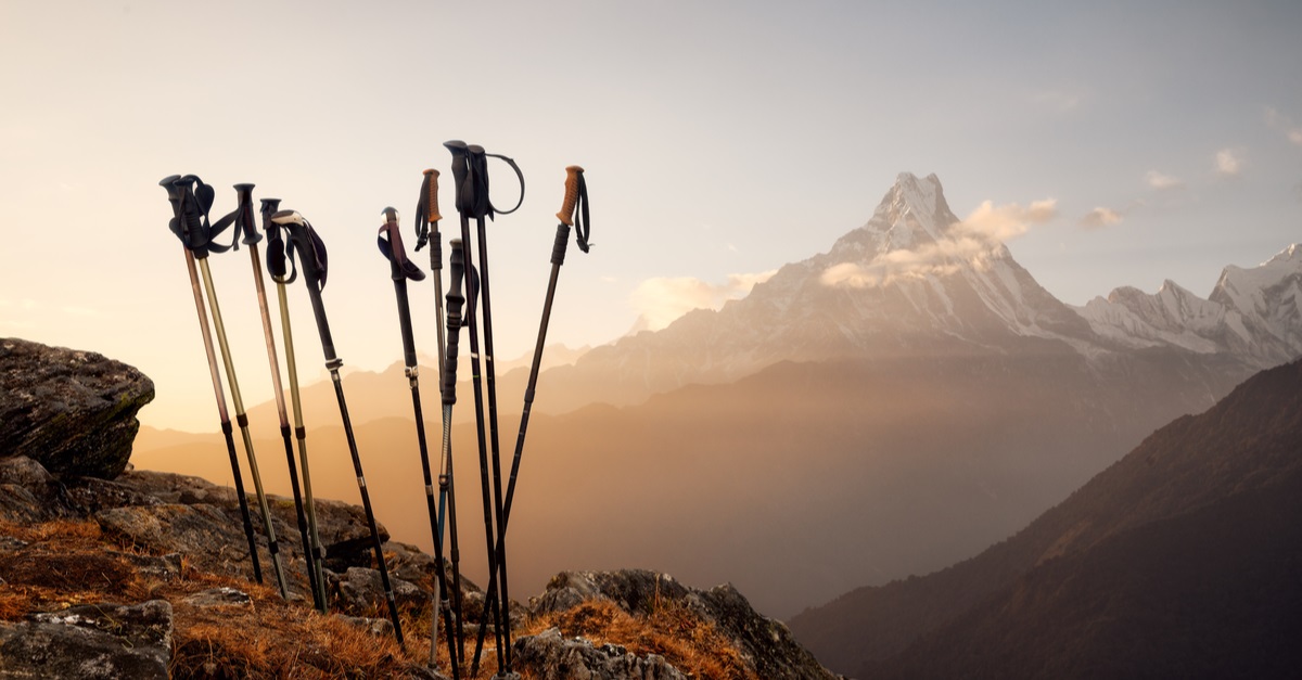 trekking sticks on a mountain top