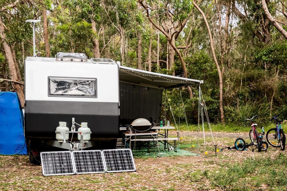 RV Caravan Camper on Campsite with Solar and Propane Power